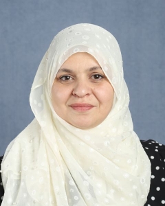 A woman with white hijab